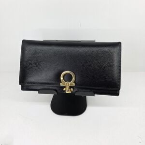 Elegant Black Wallet with Gold Clasp